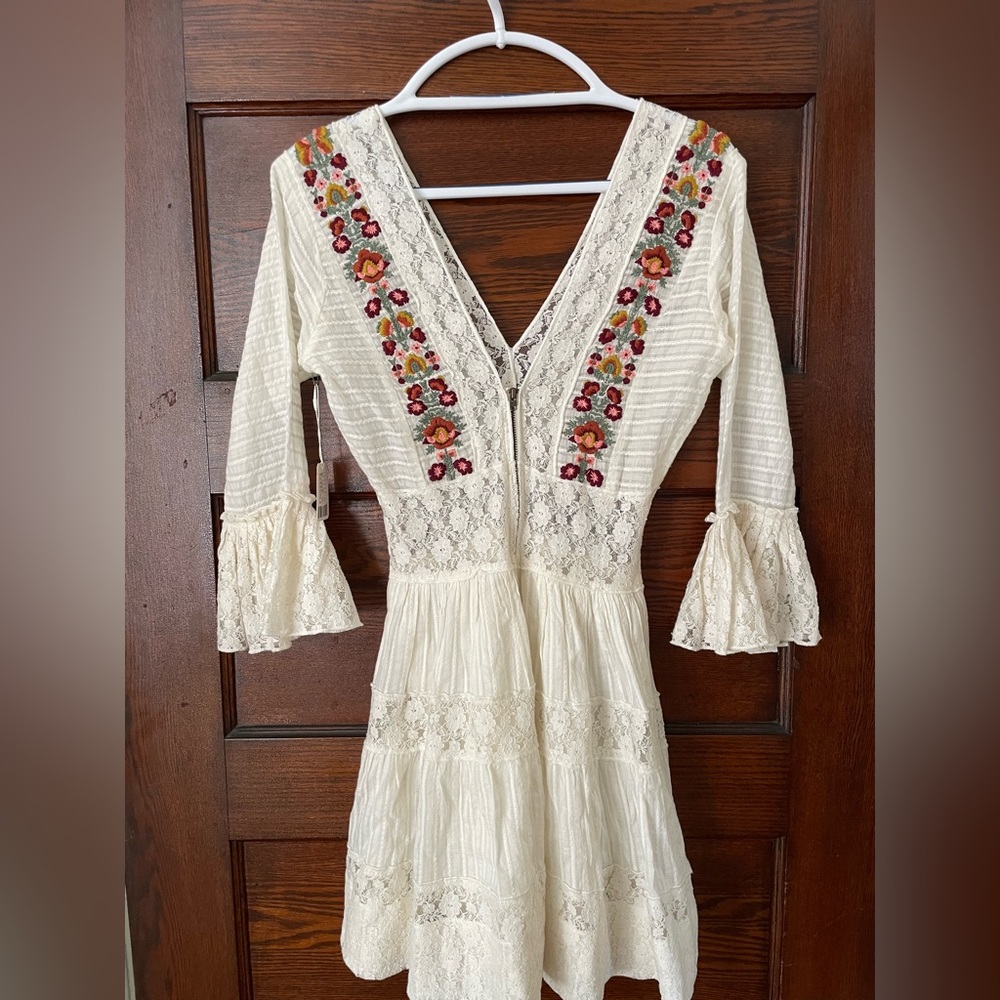 Free People, size 6, white and embroidered mini dress.